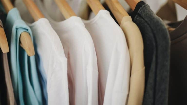 Clothing hanging on hangers.