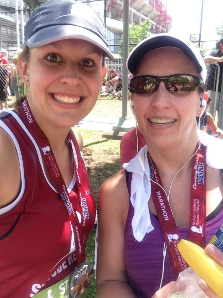 My running friend Rebecca and me after running a marathon.